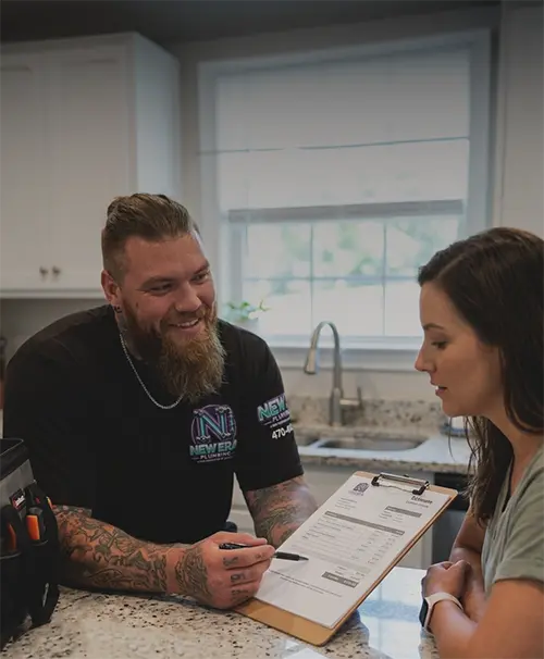 josh-from-new-era-plumbing-in-mesa-arizona-giving-customer-estimate-for-job