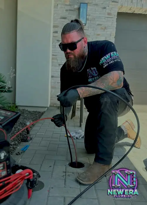josh-from-new-era-plumbing-in-mesa-arizona-hydro-jetting-blocked-drain